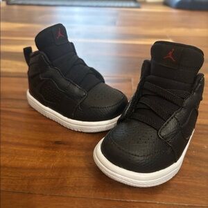 Toddler size 5c Black Jordan sneaker w/ red air Jordan